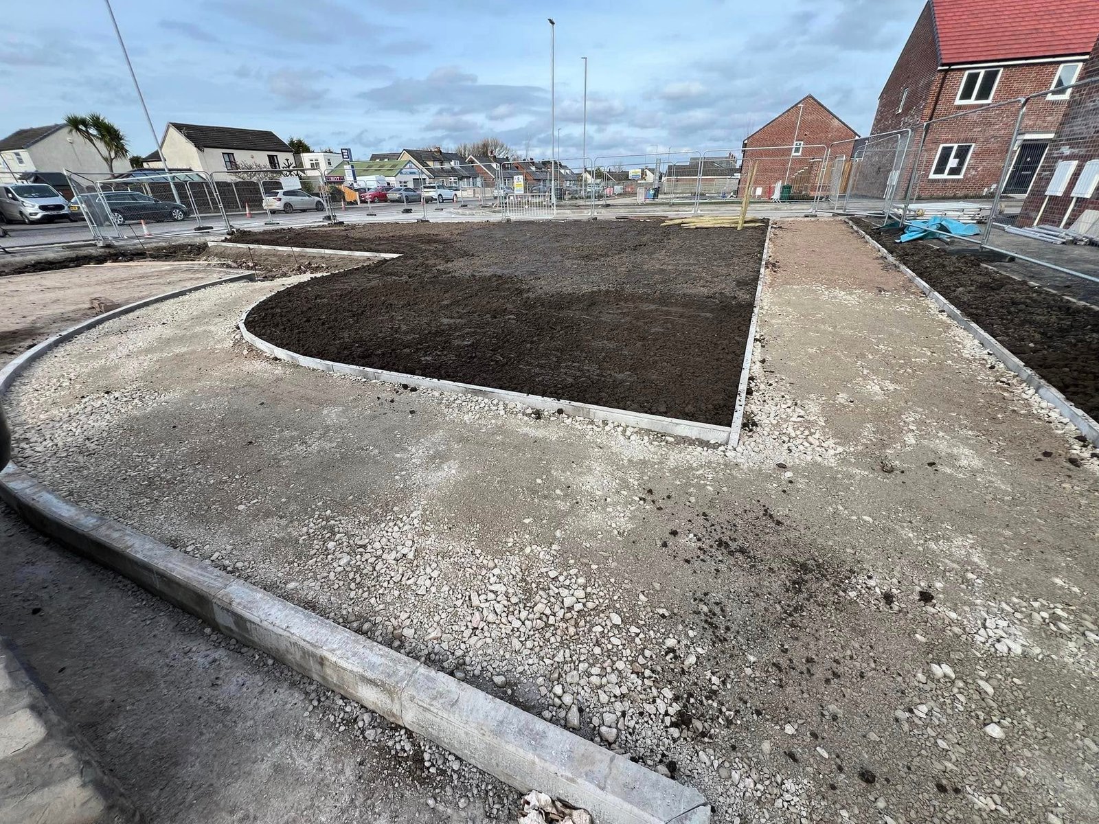 Groundworks site with newly installed kerbing